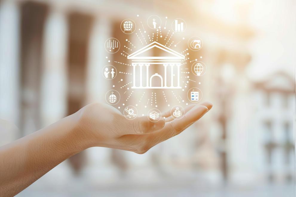 A hand sustaining a pictogram of a temple