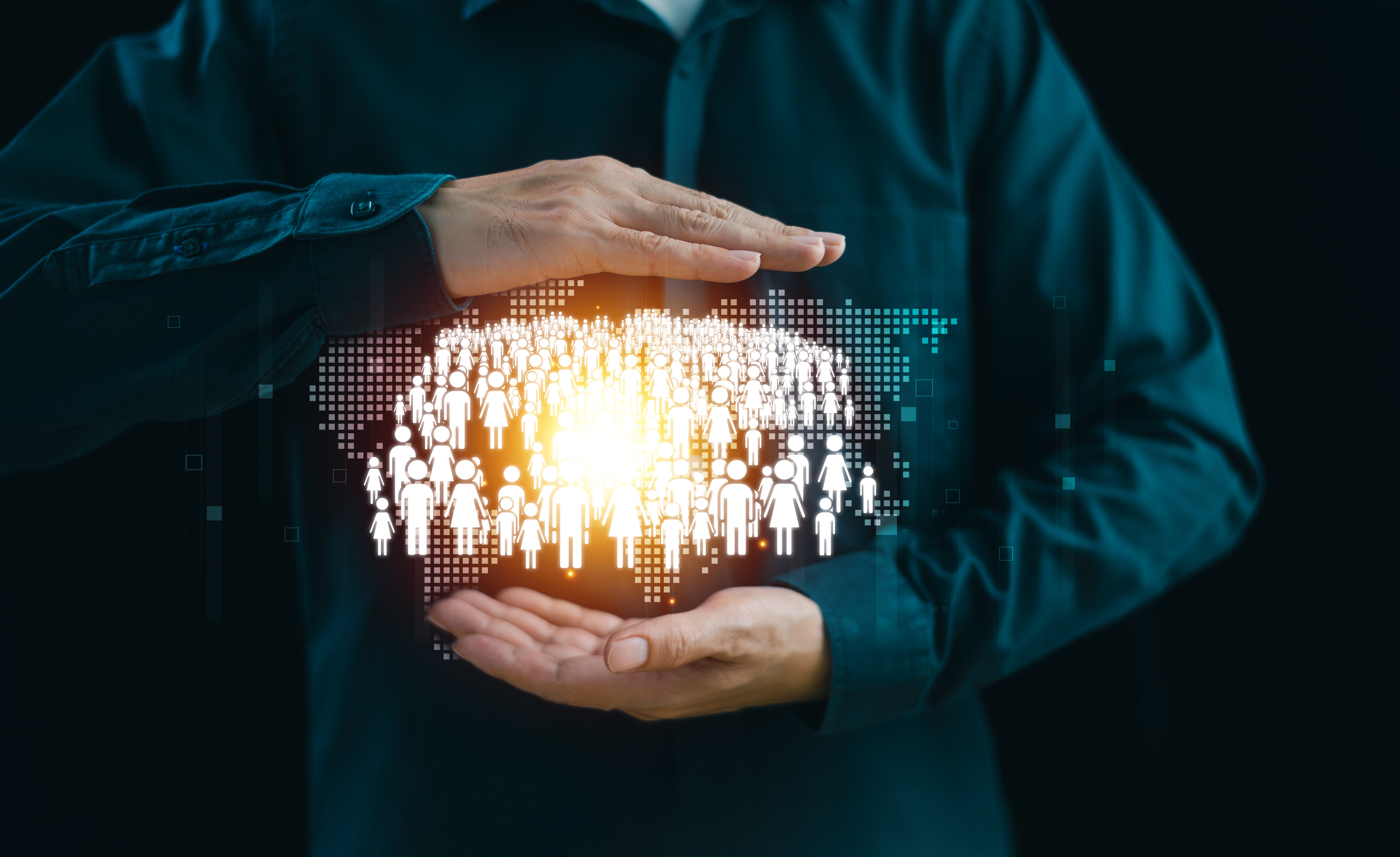 Digital image of population hold between two hands
